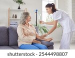 Young friendly nurse or caregiver help sick senior elderly woman patient in receiving IV drip infusion and vitamin injection therapy sitting on sofa in medical clinic or at home. Health care concept.