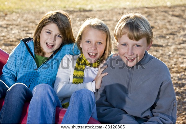 Young Friends 1011 Years Sitting Together Stock Photo (Edit Now) 63120805