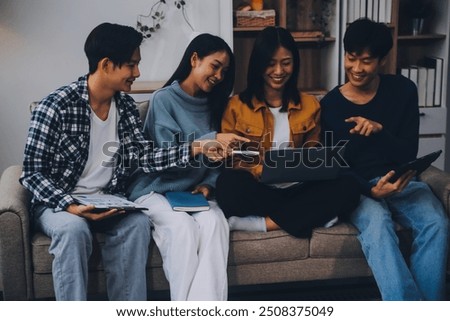 Young friends doing school assignment together at home
