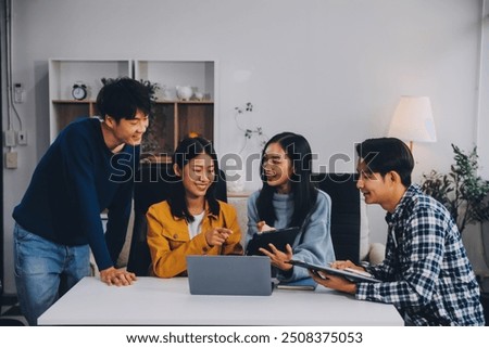 Young friends doing school assignment together at home