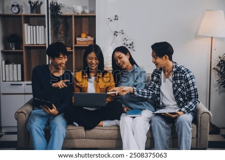 Young friends doing school assignment together at home