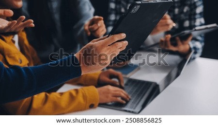 Young friends doing school assignment together at home