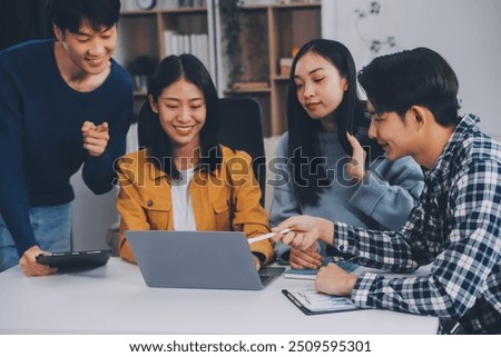 Young friends doing school assignment together at home