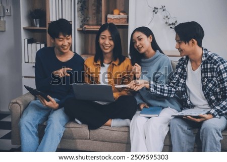 Young friends doing school assignment together at home