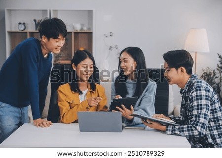 Young friends doing school assignment together at home