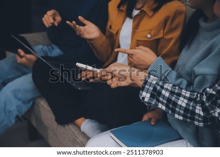 Young friends doing school assignment together at home