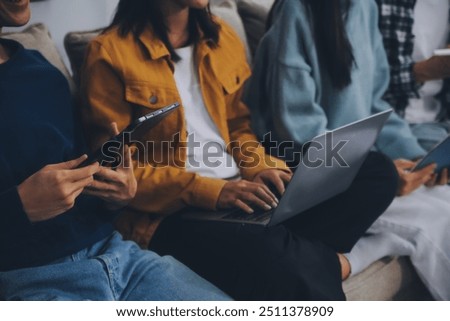 Young friends doing school assignment together at home