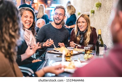 Young Friends Having Fun Drinking White Wine At Street Food Event - Happy People Eating Local Meal Plates At Open Air Restaurant Together - Travel And Dinning Life Style Concept On Bulb Light Filter