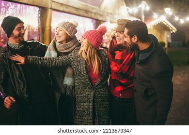 Young friends having fun outdoor during winter time - Soft focus on right girl face - Shutterstock ID 2213673347