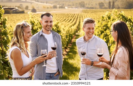 Young friends having fun outdoors - Happy people enjoying harvest time together at farmhouse winery countryside - Tasting red wine at vineyard - Powered by Shutterstock