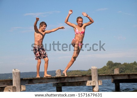 Similar – Image, Stock Photo Girl on jetty Joy Summer