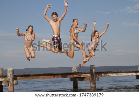 Similar – Image, Stock Photo Girl on jetty Joy Summer