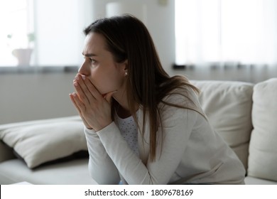 Young frustrated worried woman feeling stressed of difficult life situation. Doubtful unhappy millennial girl suffering from psychological problem, thinking of hard decision, depression concept. - Shutterstock ID 1809678169