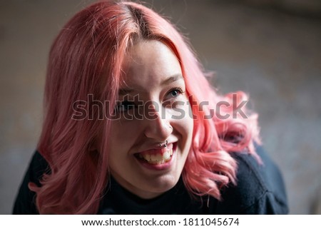 Similar – Image, Stock Photo Portrait of a laughing young woman with turquoise hair