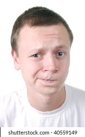 Young Funny Confused Guy. Isolated On The White Background.