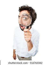 Young Funny Man With Magnifier. Surprise Expression