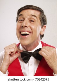 Young And Funny Waiter Portrait On White Background.