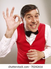 Young And Funny Waiter Portrait On White Background.