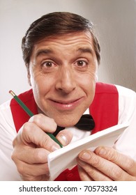 Young And Funny Waiter Portrait On White Background. Waiter Portrait Taking Order.