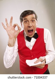 Young And Funny Waiter Portrait On White Background. Waiter Portrait Taking Order.