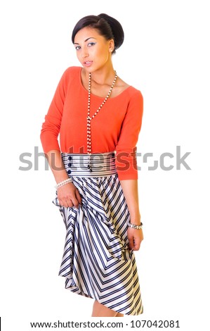 a young funny woman in a long skirt. style of the '60s. isolated on a white background