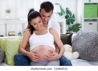 Young future parent enjoying together - Powered by Shutterstock