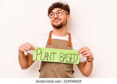 Young Gardener Man Holding Plant Based Placard Isolated On White Background