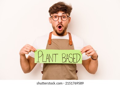 Young Gardener Man Holding Plant Based Placard Isolated On White Background