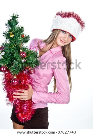 young gay girl dressed as Santa Claus with Christmas tree in his hand, isolated over white