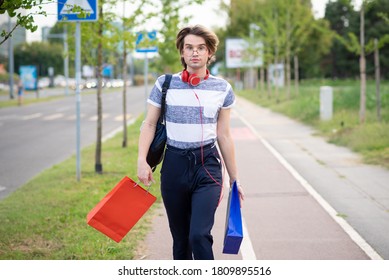 Young Gay Man Shopping With Shopping Bags