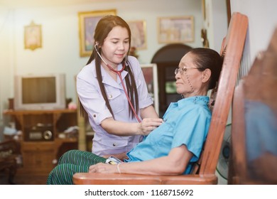 Young General Nurse Come To Elder Patient Home For Community Service In Thailand Public Health Jobs