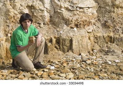 Young Geologist Studying Rock Type 2