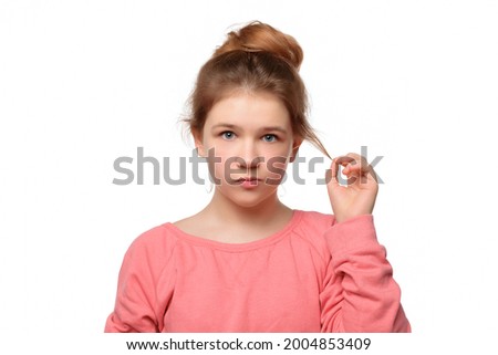 young girl 12-14 years old feeling happiness, waiting for good thing happen, smiling leaning face on palms. True human reactions, emotions and feelings, white background