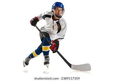 Young girl, athlete, hockey player in motion, training, playing isolated over white background. Championship. Concept of professional sport, competition, game, action and hobby - Powered by Shutterstock