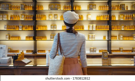 Young girl in a beauty store in Paris, France