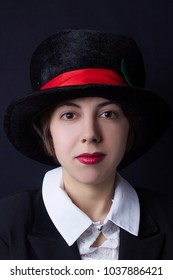 A Young Girl In A Black Velvet Hat Magician