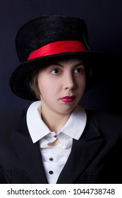 A Young Girl In A Black Velvet Hat Magician