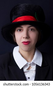 A Young Girl In A Black Velvet Hat Magician