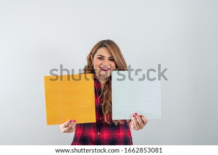 Young girl with blond hair with email and gmail icons, with red plaid shirt and white background 