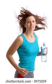 young girl in blue shirt is running with a water bottle in her hands