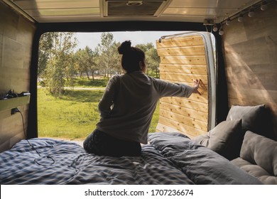 Young girl in a campervan 