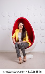 young girl in chair - egg, beauty and Fashion photo