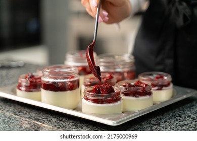 young girl chef makes desserts. bakes sweets and cakes. makes blanks and prepares fruits for the filling. baking, dessert, sweets, complex cooking processes. - Powered by Shutterstock