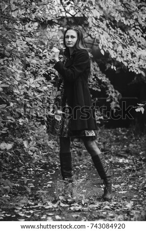 Similar – Woman with a bike in the middle of the forest.