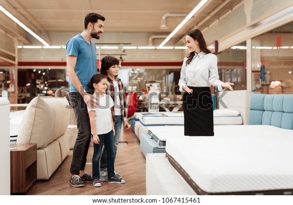 Young Girl Consultant Demonstrates Orthopedic Mattress Stock Photo Edit Now 1067415461