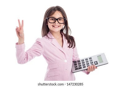 Young girl counting a calculator and holding up two fingers. Isolated on white background.