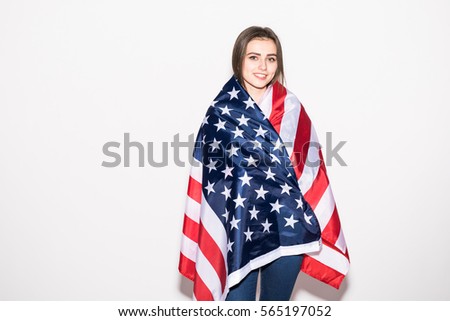 Young girl covered US flag on white