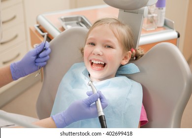 Young Girl At Dentist., Dental Treatment 
