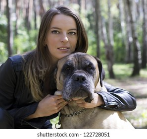 the young girl with a dog in park