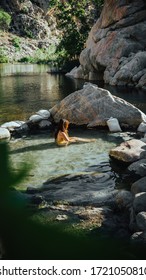 Young Girl Dreaming In A Hot Tub At The Deep Creek Hot Springs In California, USA